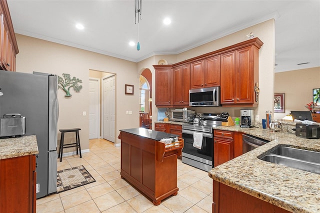 kitchen featuring appliances with stainless steel finishes, sink, light tile patterned floors, crown molding, and light stone countertops