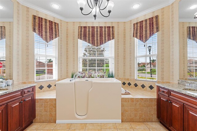 4496 Strathmore Dr, Lake Wales, FL 33859 - bathroom with tile patterned flooring, a bath, a chandelier, vanity, and ornamental molding