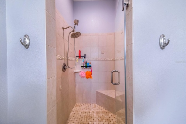 bathroom featuring a stall shower