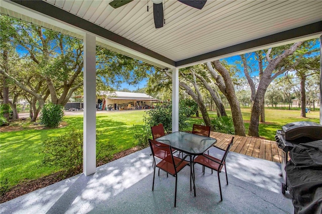 view of patio / terrace with area for grilling and ceiling fan