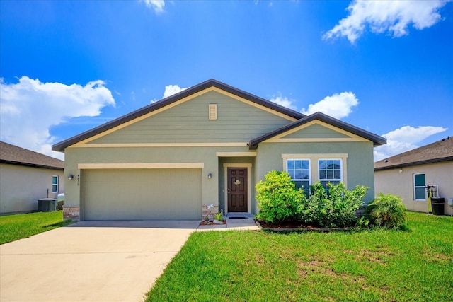 view of front of home with a garage, central AC, driveway, stucco siding, and a front lawn