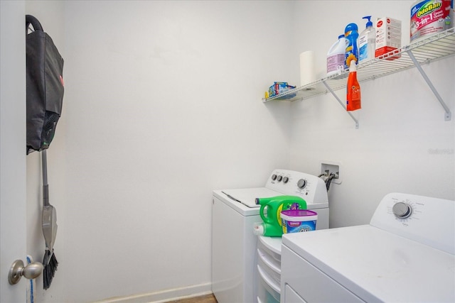 washroom with laundry area and separate washer and dryer