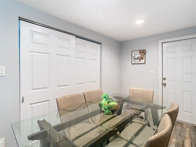 dining space featuring hardwood / wood-style flooring