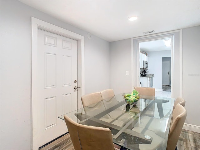 dining room featuring hardwood / wood-style flooring