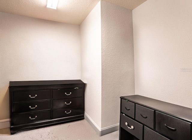 bedroom featuring a textured ceiling