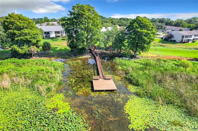 bird's eye view with a water view