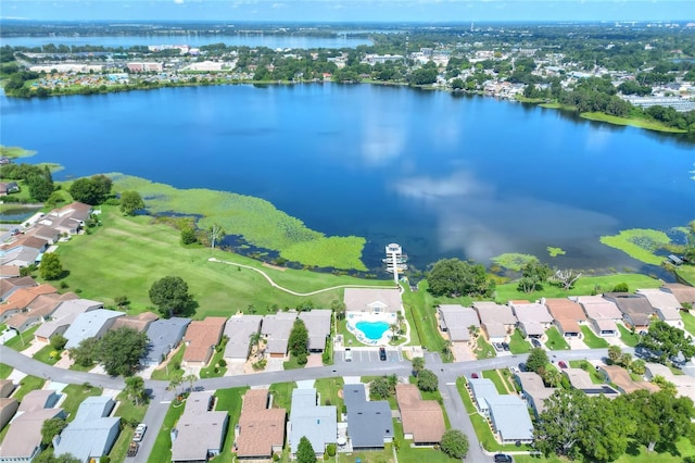 bird's eye view featuring a water view and a residential view