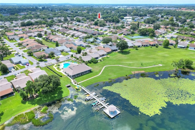 bird's eye view with a water view and a residential view