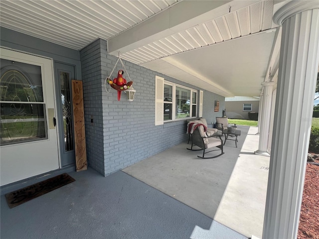 view of patio featuring covered porch