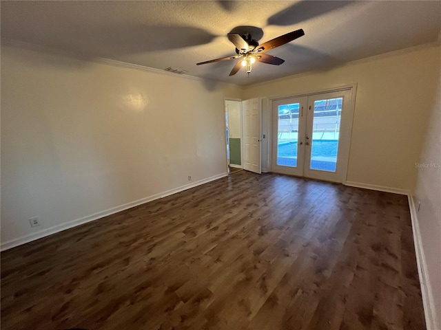 spare room featuring french doors, ceiling fan, crown molding, dark wood-style floors, and baseboards