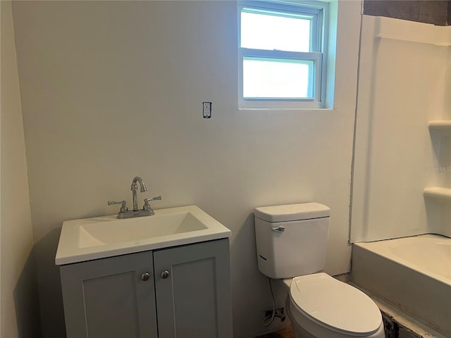 full bathroom featuring plus walk in shower, toilet, and vanity