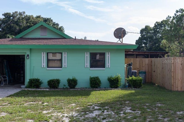 view of home's exterior featuring a lawn