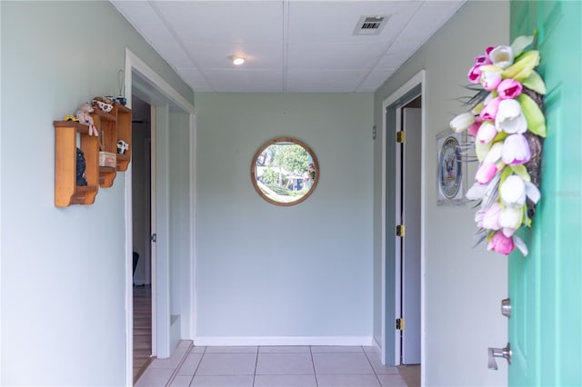 corridor featuring tile patterned floors