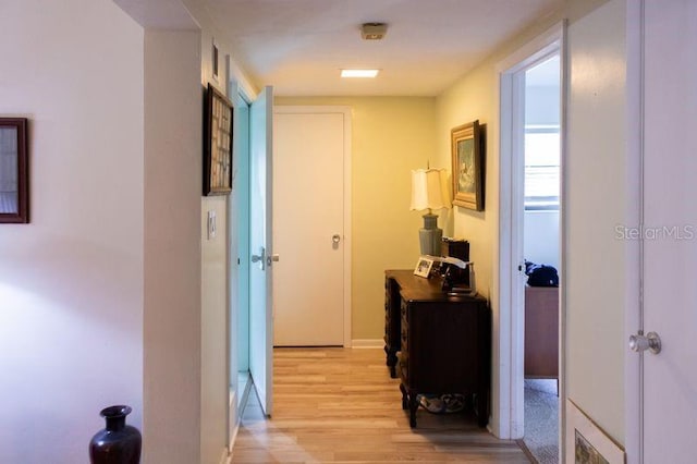 corridor featuring light wood-type flooring