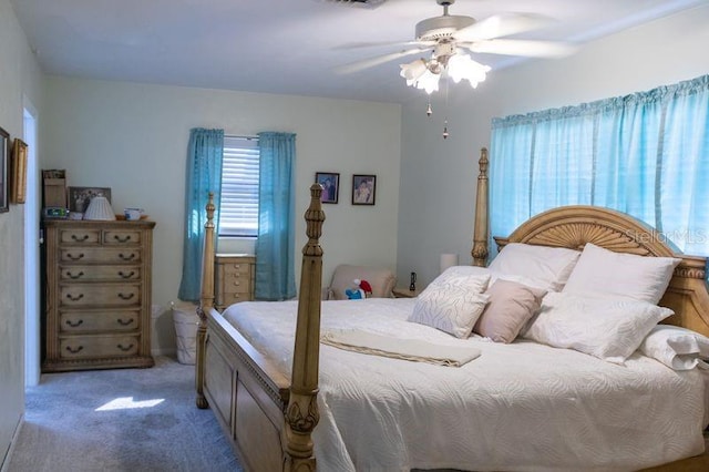 bedroom with light colored carpet and ceiling fan