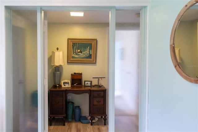 office area with light wood-type flooring