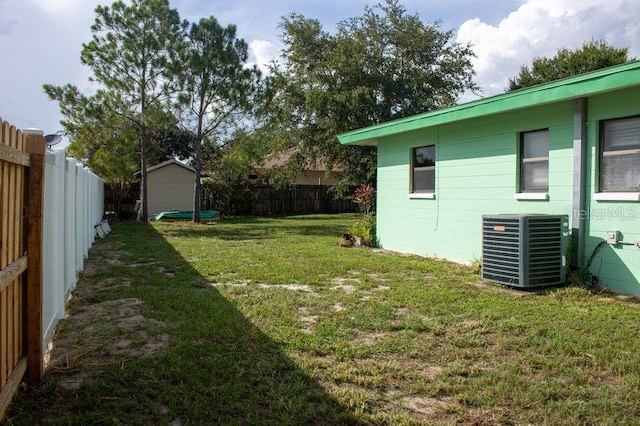 view of yard with central AC