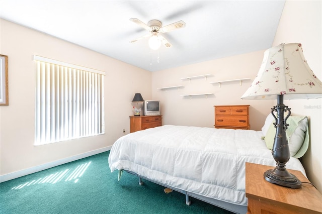 bedroom featuring a ceiling fan, baseboards, and carpet flooring