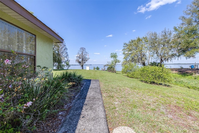 view of yard with a water view