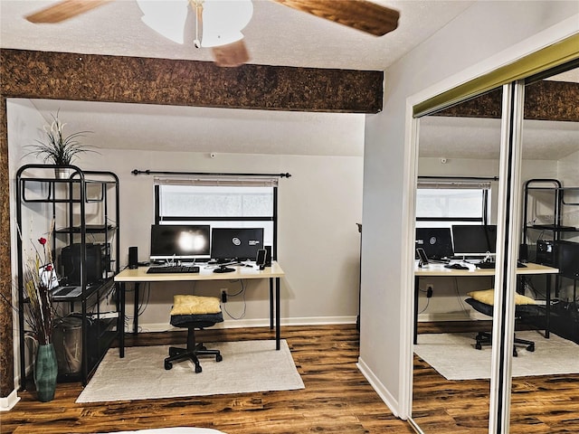 home office featuring hardwood / wood-style flooring, a textured ceiling, and ceiling fan