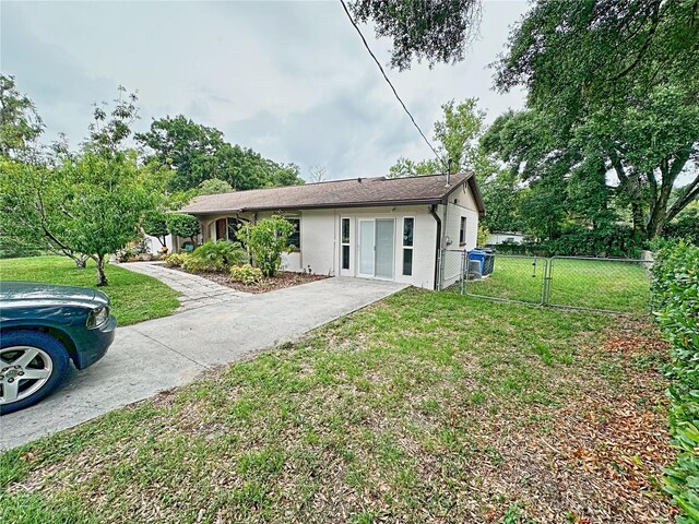 view of front of home with a front lawn