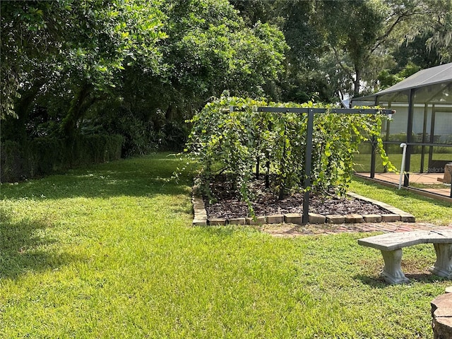 view of yard featuring a lanai