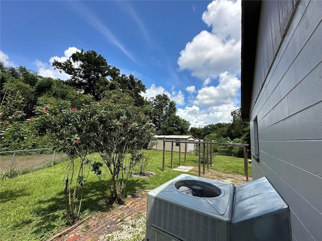 view of yard featuring central AC