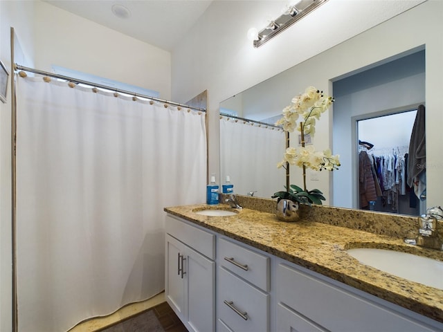 bathroom featuring double sink vanity