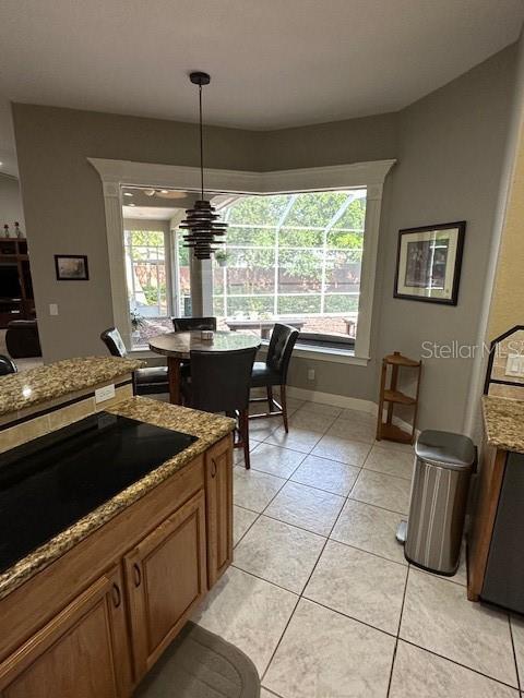 interior space with tile patterned flooring and a wealth of natural light