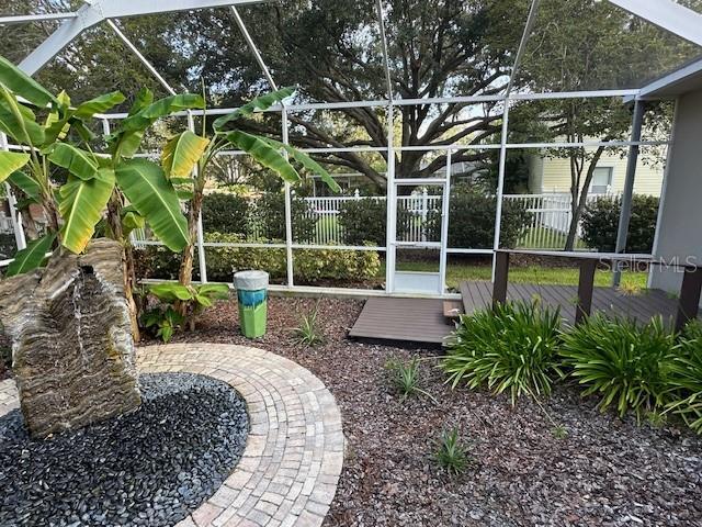 view of yard featuring a lanai