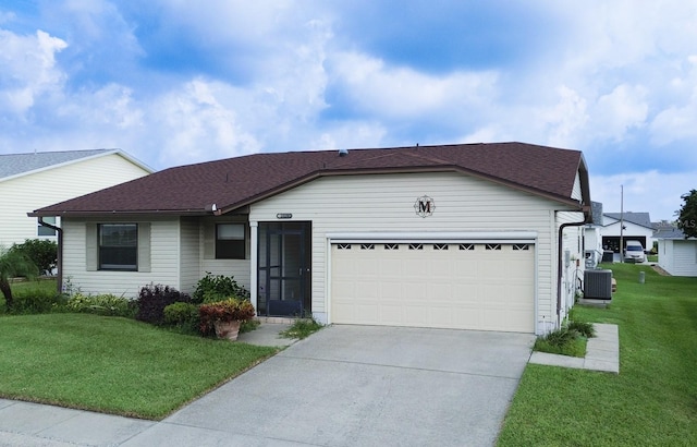 single story home with a garage, cooling unit, and a front lawn