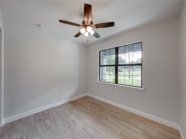 spare room with ceiling fan and light hardwood / wood-style floors