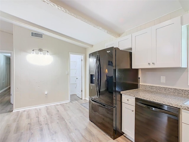 kitchen featuring lofted ceiling with beams, visible vents, white cabinetry, light wood-type flooring, and black appliances