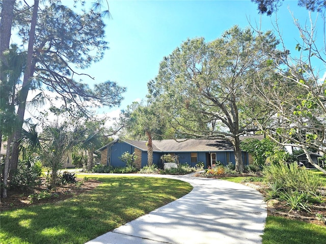 view of front of home with a front lawn