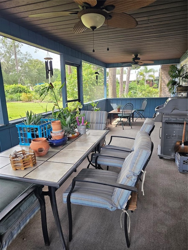 view of patio / terrace with area for grilling and ceiling fan