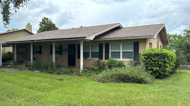 ranch-style house with a front yard