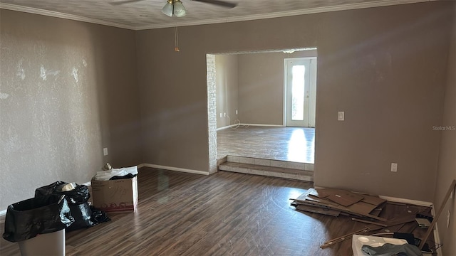 spare room with ornamental molding, hardwood / wood-style floors, and ceiling fan