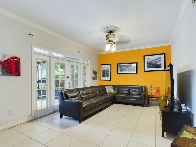 tiled living room with ceiling fan, french doors, and ornamental molding