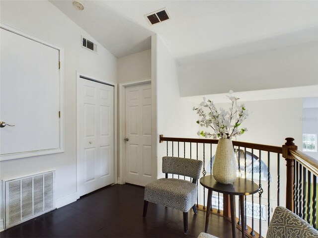 5219 Mystic Point Ct, Orlando, FL 32812 - unfurnished room featuring dark wood-style flooring, visible vents, and vaulted ceiling