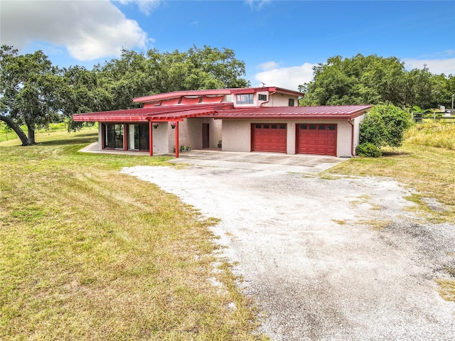 garage with a yard