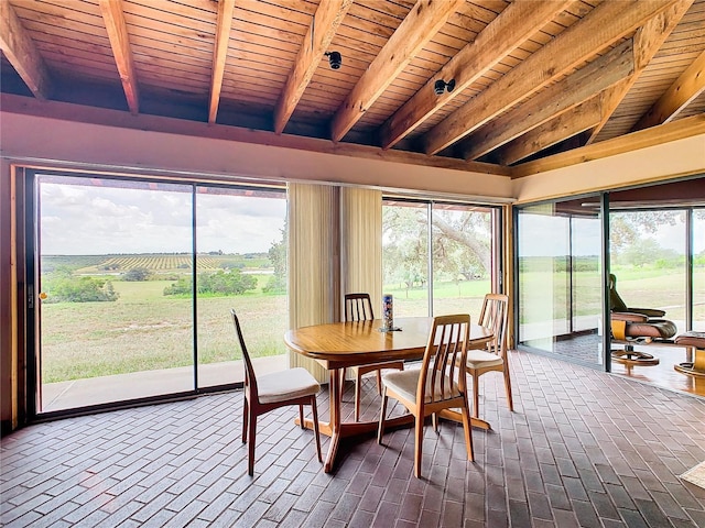 2741 Edwards Rd, Haines City, FL 33844 - sunroom / solarium featuring beamed ceiling and plenty of natural light
