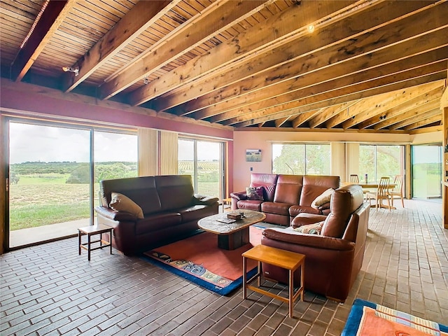 2741 Edwards Rd, Haines City, FL 33844 - living area with brick floors and a wood ceiling with exposed beams