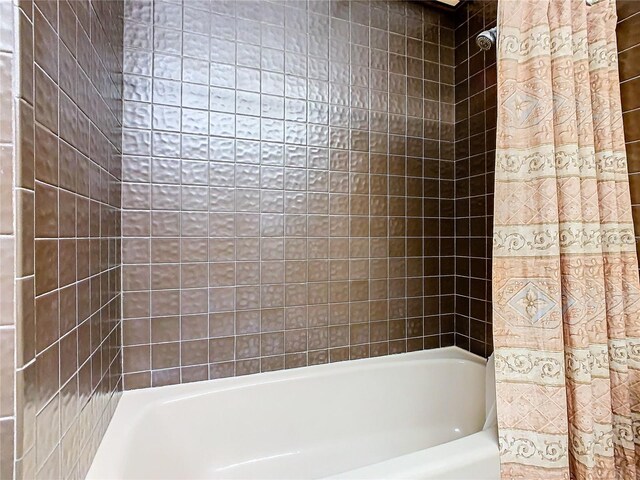 2741 Edwards Rd, Haines City, FL 33844 - full bath with shower / bathtub combination with curtain