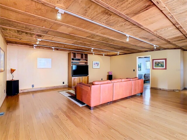 2741 Edwards Rd, Haines City, FL 33844 - living room with track lighting, light wood-type flooring, and wood ceiling