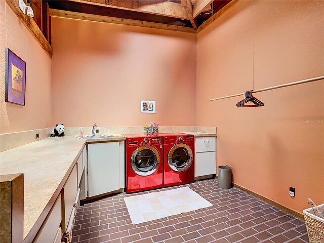 2741 Edwards Rd, Haines City, FL 33844 - washroom featuring cabinet space and separate washer and dryer
