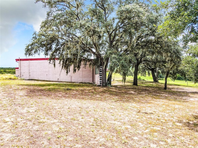 2741 Edwards Rd, Haines City, FL 33844 - view of yard featuring an outbuilding and an outdoor structure