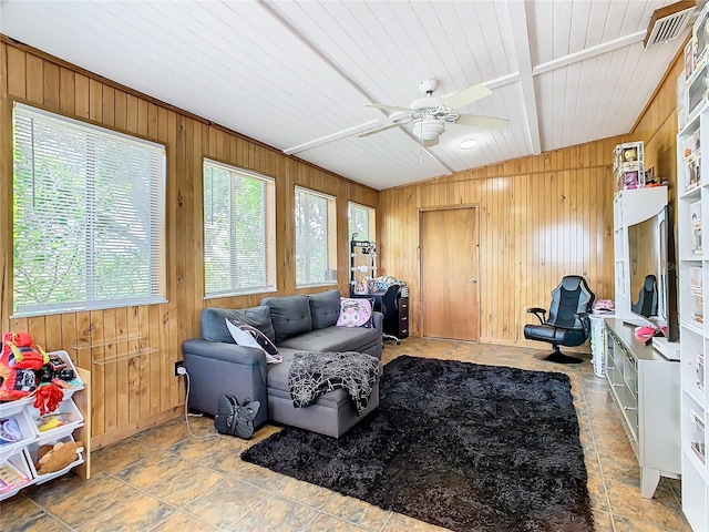 2741 Edwards Rd, Haines City, FL 33844 - living area with wooden walls, a ceiling fan, and wooden ceiling