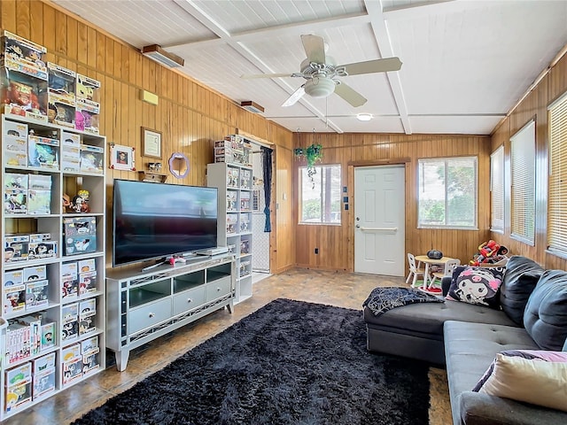 2741 Edwards Rd, Haines City, FL 33844 - living room featuring wooden walls and a ceiling fan