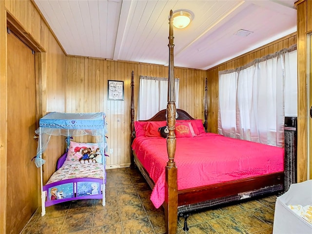 tiled bedroom with wooden walls