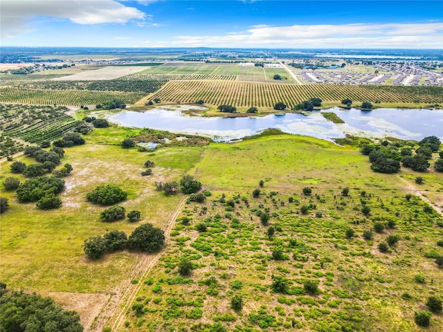 2741 Edwards Rd, Haines City, FL 33844 - view of rural area with large plots for crops and a nearby body of water
